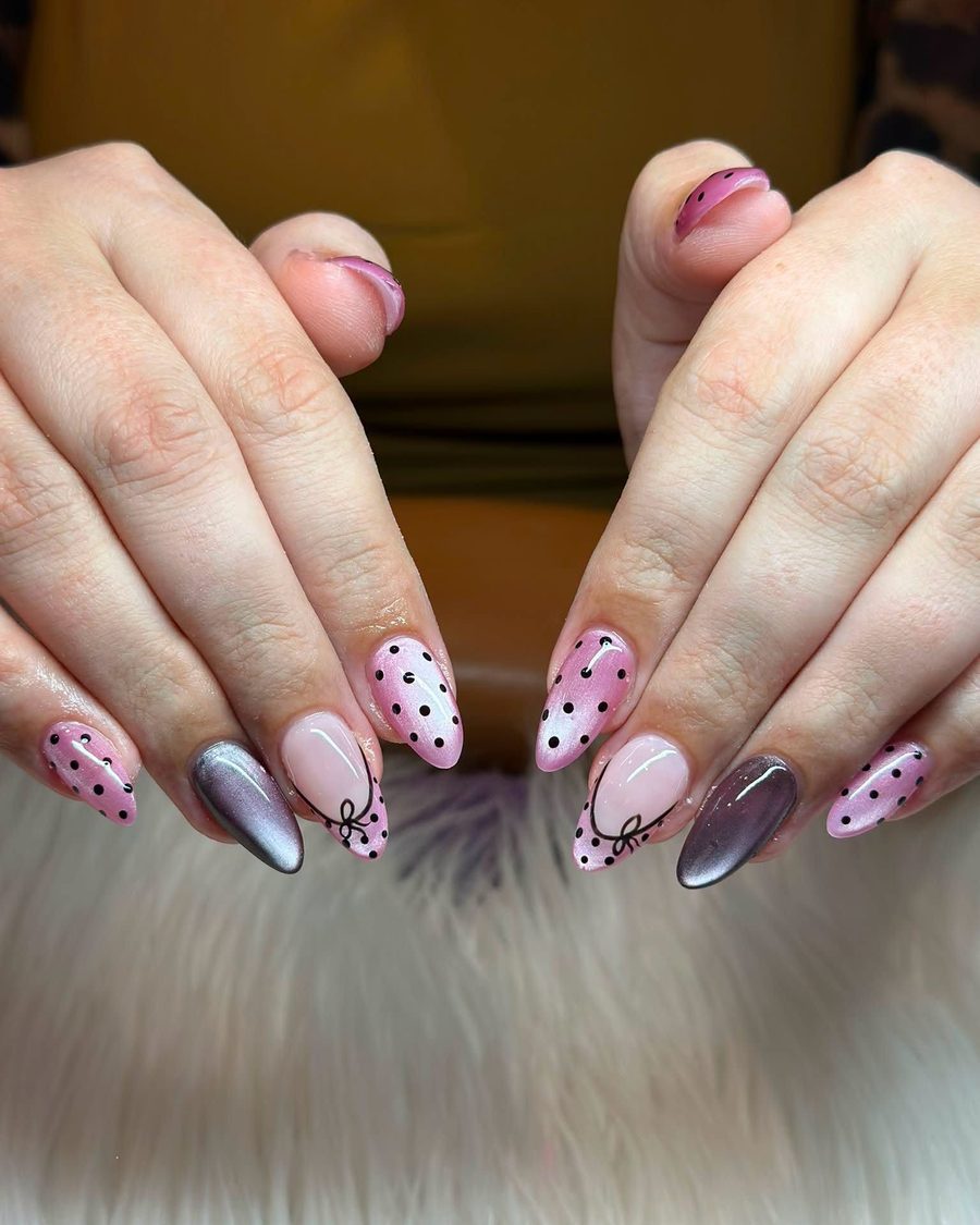 Nude almond nails with polka dots and chrome accent nails