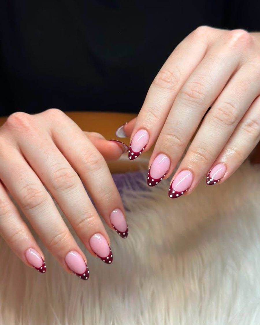 Short French tip nails with red cherry and dot art