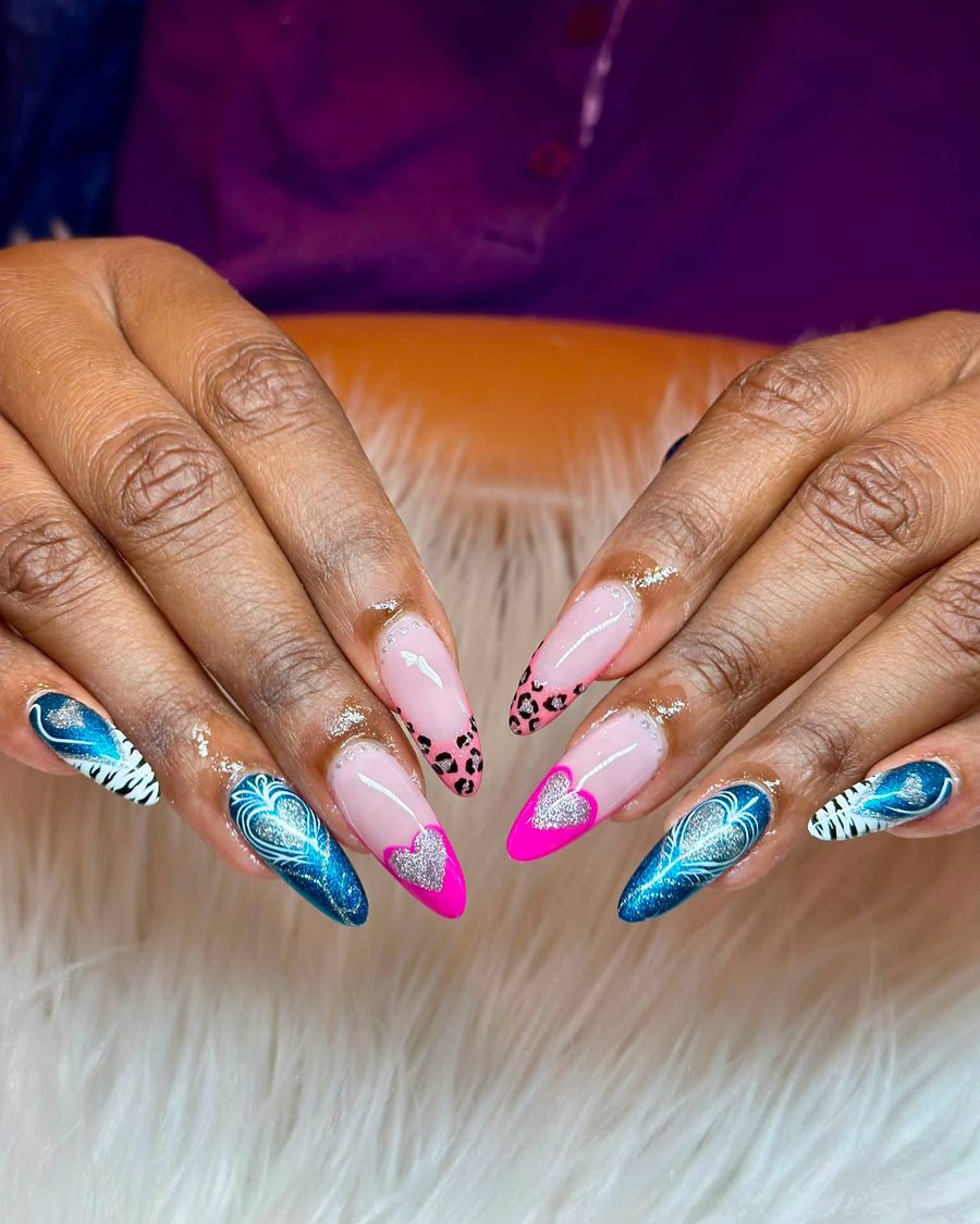 Hot pink and blue tropical art on long almond nails